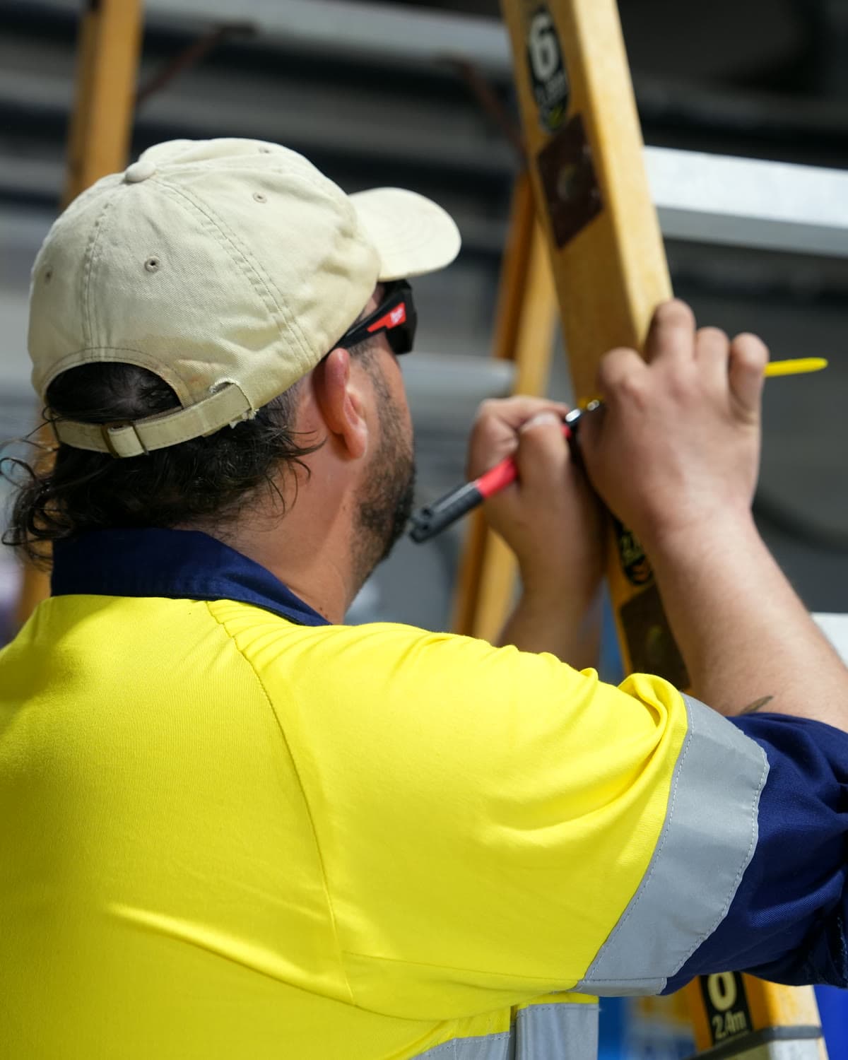 Tagging a ladder during a site inspection